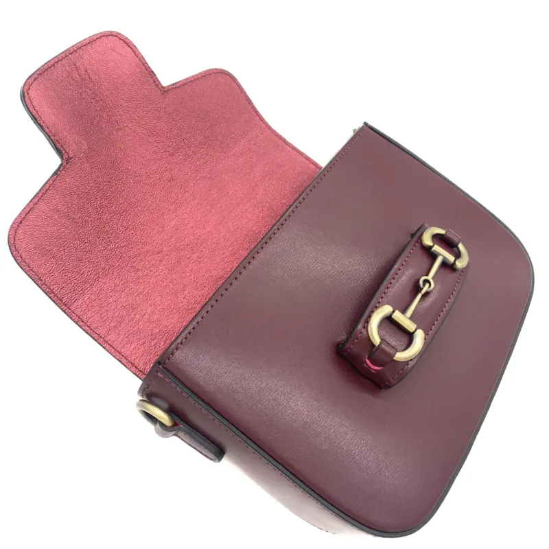 horsy bordeaux crossbody leather bag layed