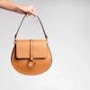 loop camel leather shoulder bag on model