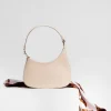 moon beige shoulder leather bag on model