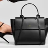 tie black leather handbag on set