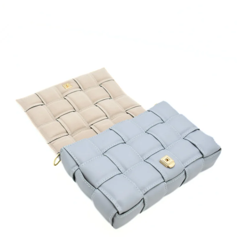 Braid Blue Crossbody Leather Bag layed Braid Blue Crossbody Leather Bag layed