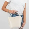 Star beige leather bag on model