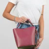 Star bordeaux leather bag on model
