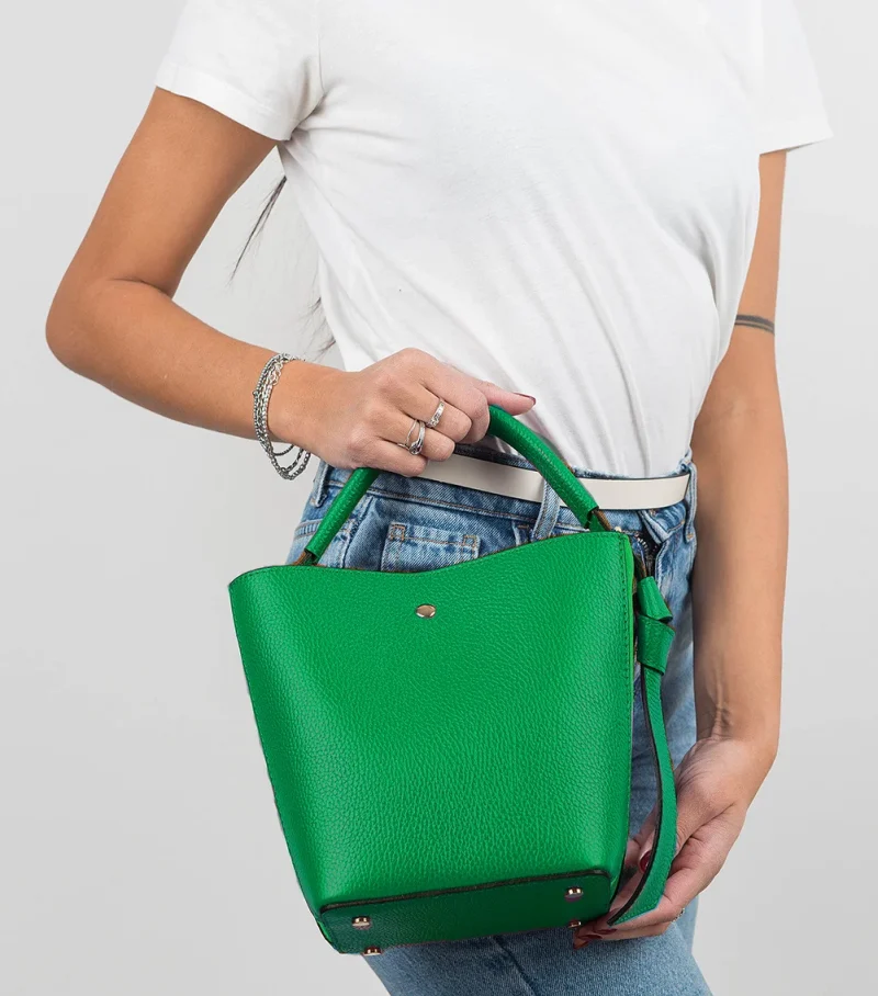 Star green leather bag on model