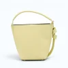 Flow butter yellow leather handbag  back opened