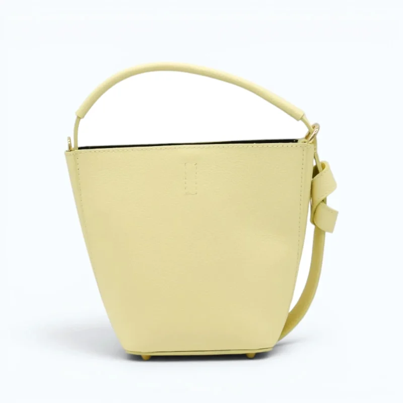 Flow butter yellow leather handbag  back opened