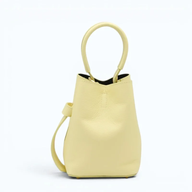 Flow butter yellow leather handbag  closed