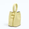 Flow butter yellow leather handbag  closed side