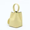 Flow butter yellow leather handbag  closed side 2