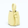 Flow butter yellow leather handbag  closed side