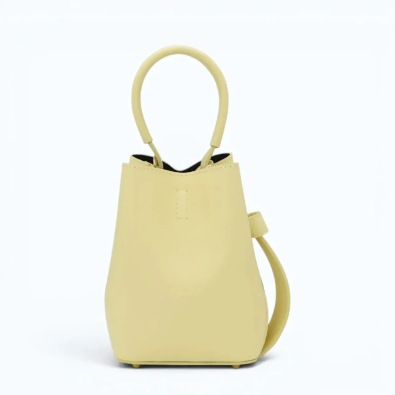 Flow butter yellow leather handbag  closed front