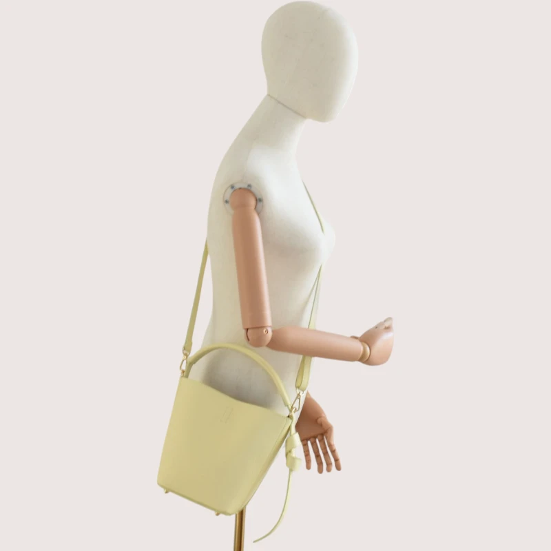 Flow butter yellow leather handbag  crossbody style