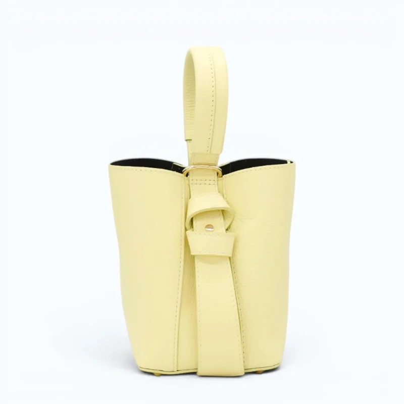 Flow butter yellow leather handbag  closed closed details
