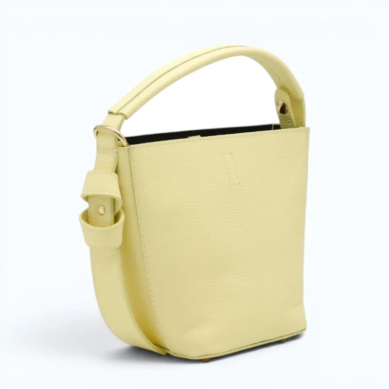 Flow butter yellow leather handbag  side