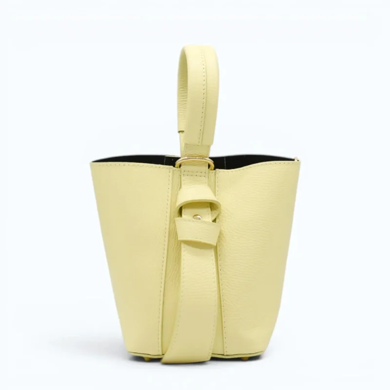 Flow butter yellow leather handbag  side detail