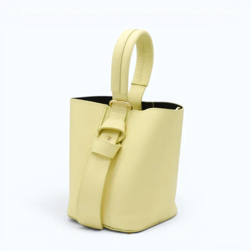 Flow butter yellow leather handbag  side detail2