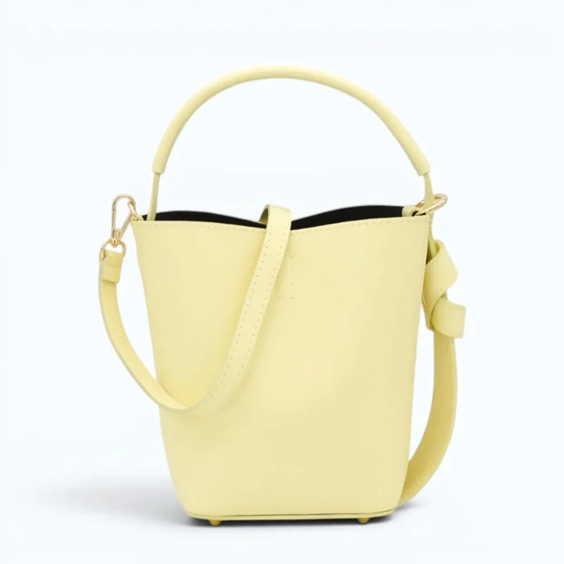 Flow butter yellow leather handbag  strap