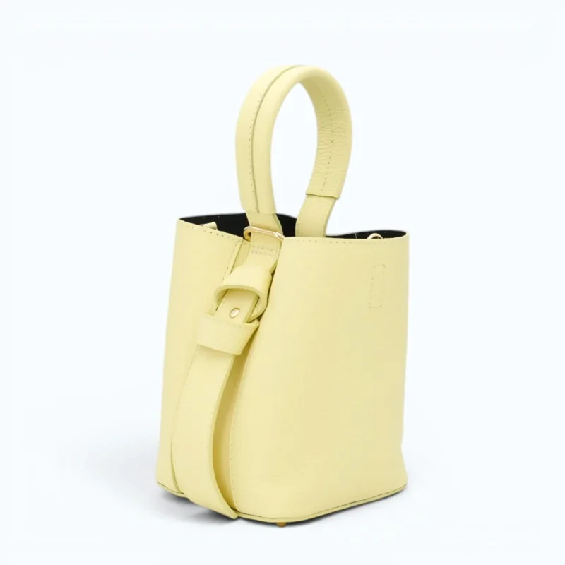 Flow butter yellow leather handbag side