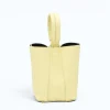 Flow butter yellow leather handbag back