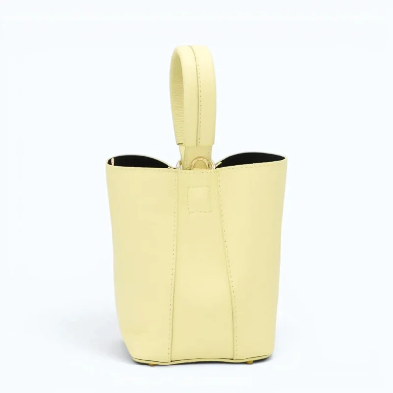 Flow butter yellow leather handbag back