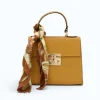 diva yellow leather handbag