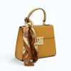 diva yellow leather handbag side
