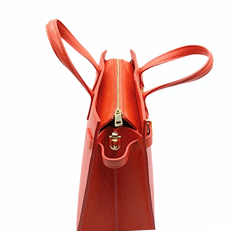 carine orange leather handbag zip detail