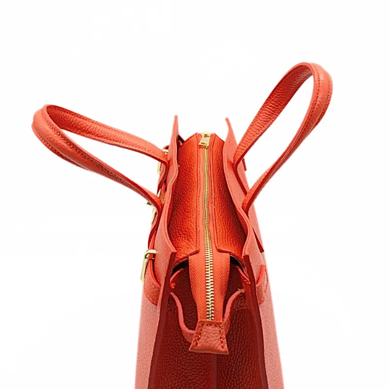 carine orange leather handbag zip