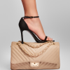 classic stripes in nude shoulder leather bag on model