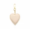 heart beige leather bag accessory