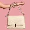 serena beige leather shoulder bag on model