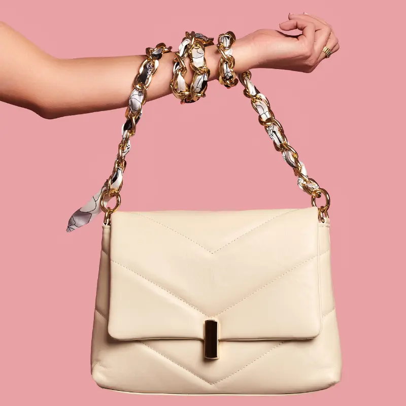 serena beige leather shoulder bag on model