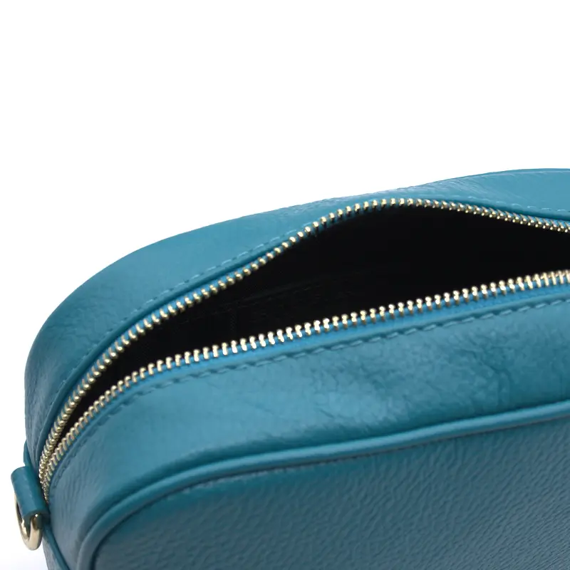 bb turquoise leather crossbody bag interior detail