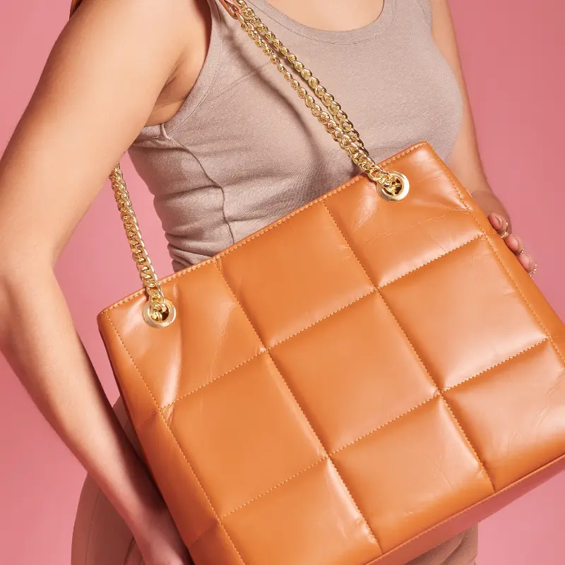 charlotte camel shoulder leather bag on model