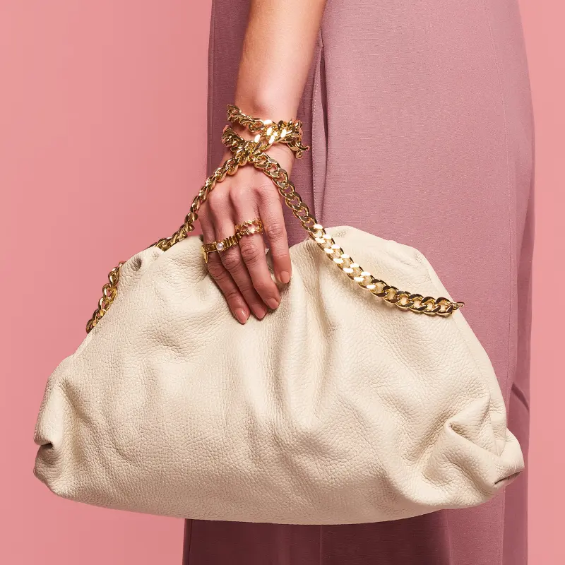 pouch beige leather handbag on model