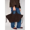 mag brown suede bag on model