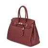 Mary bordeaux leather handbag side Mary bordeaux leather handbag side