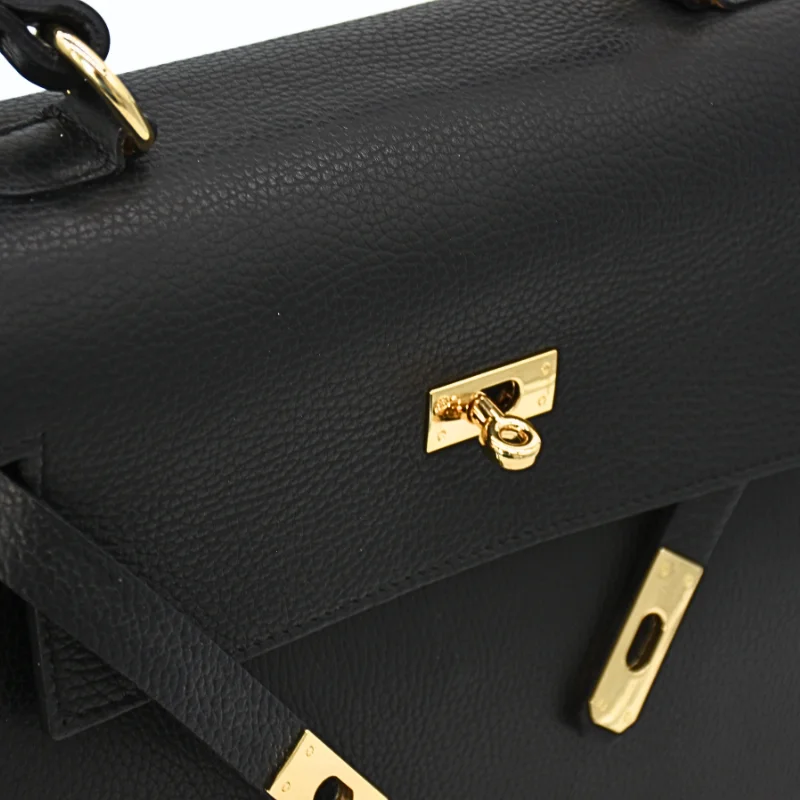 Fashionista black leather handbag detailed