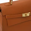 Fashionista camel leather handbag detail