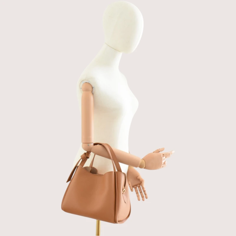 bruna camel leather handbag handbag detail hand