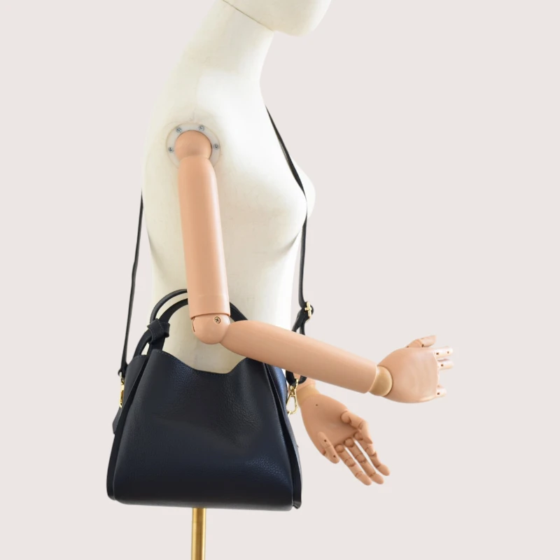 bruna navy blue leather handbag crossbody strap