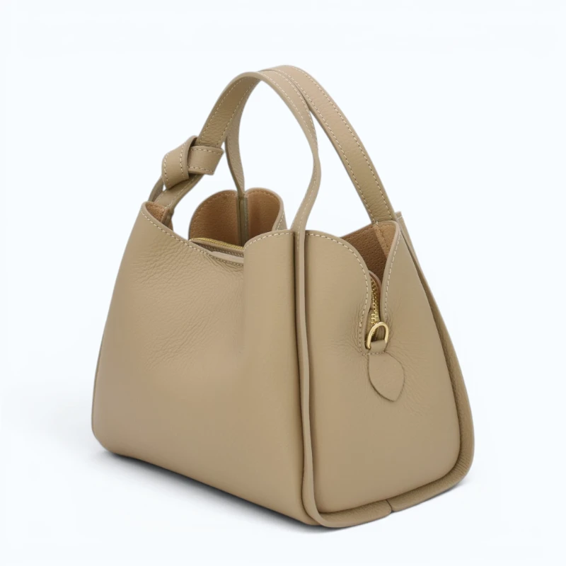 bruna taupe leather handbag side