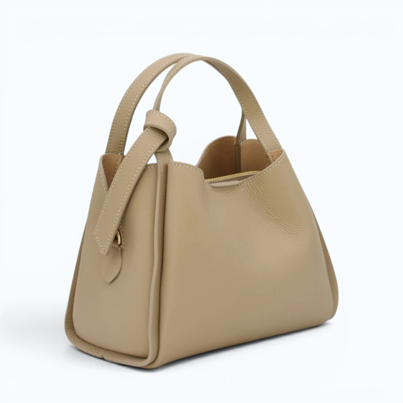 bruna taupe leather handbag right side