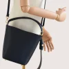 Flow Navy Blue Leather Handbag crossbody hand detail