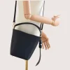 Flow Navy Blue Leather Handbag crossbody hands