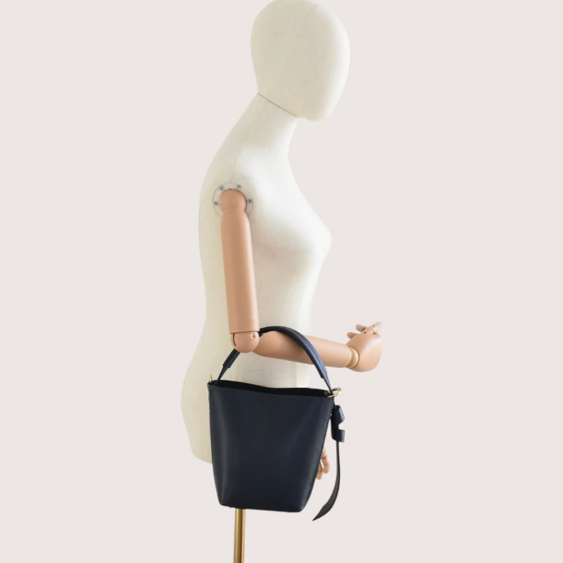 Flow Navy Blue Leather Handbag hand