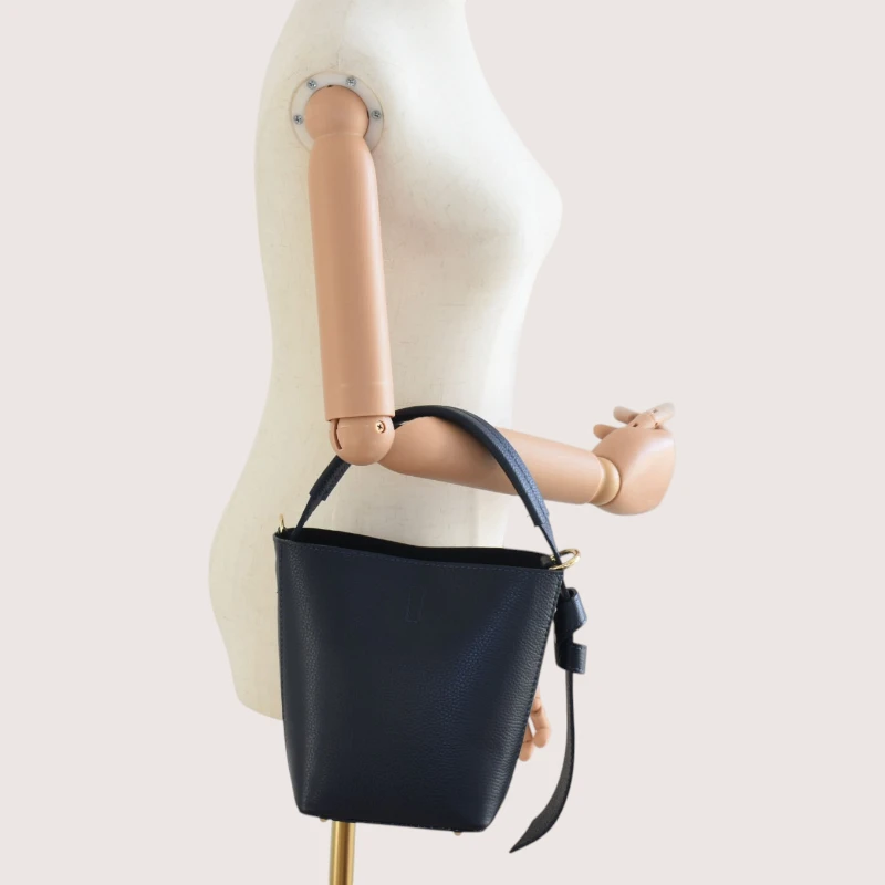 Flow Navy Blue Leather Handbag on hand