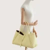 Marge butter yellow Leather handbag on hand