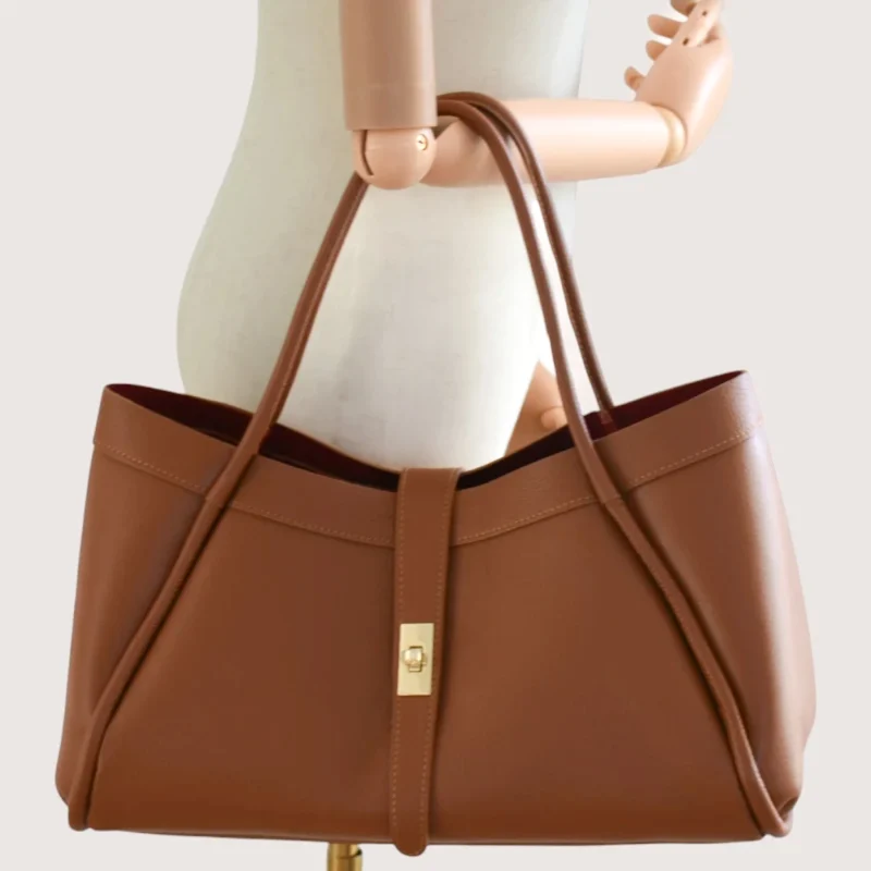 Marge camel Leather Handbag hand detail