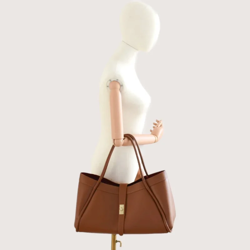 Marge camel Leather Handbag hand model